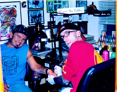 Drummer Rocky Parnell of Dallas Moore and The Snatch Wranglers getting Tattooed by TattooNeil, Cincinnati, Nov. 05.